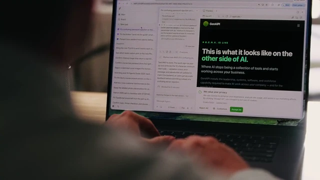 Jon Cheney using Replit on his laptop, with GenAIPI open in the website preview